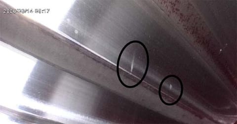 gure 6. Fine surface marks and early micropitting indications on a tooth flank.