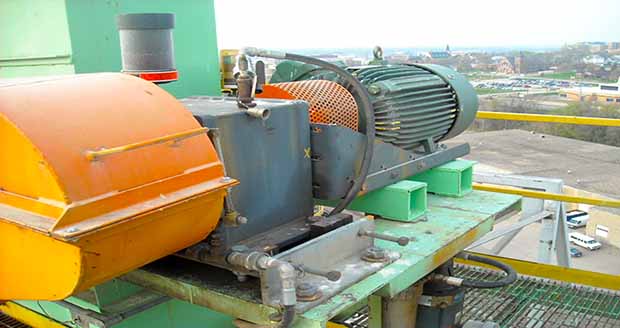 Conveyor motor with fins on all locations of the motor.