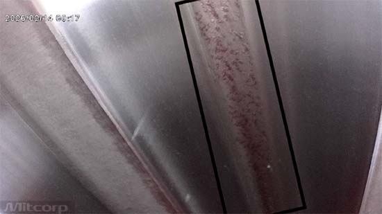 Figure 3.  Vertical oxidation banding on a gear flank, tracing the tooth contact line. A classic standstill mark.